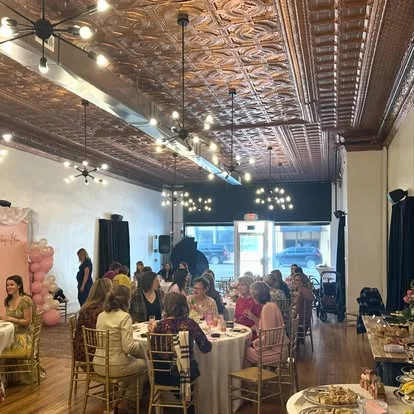 Guests mingling at an event at The Main Event