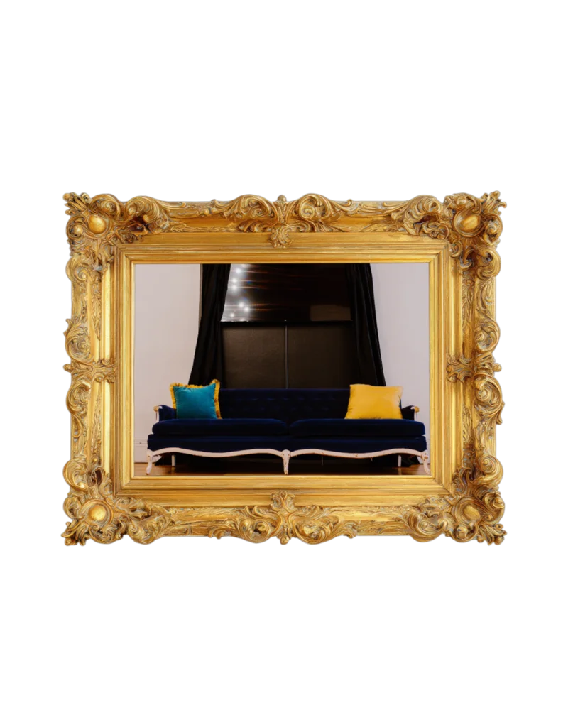 Gold-framed photo of The Main Event cozy lounge seating area